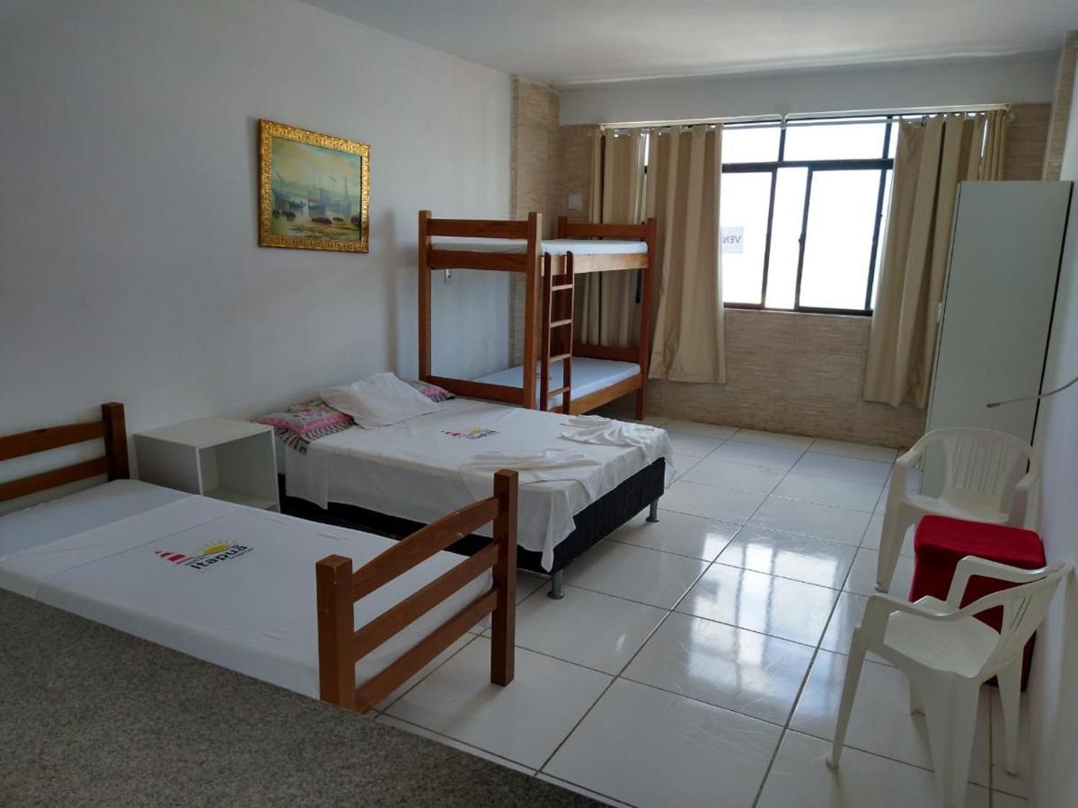 Quarto Quádruplo com Vista do Mar.