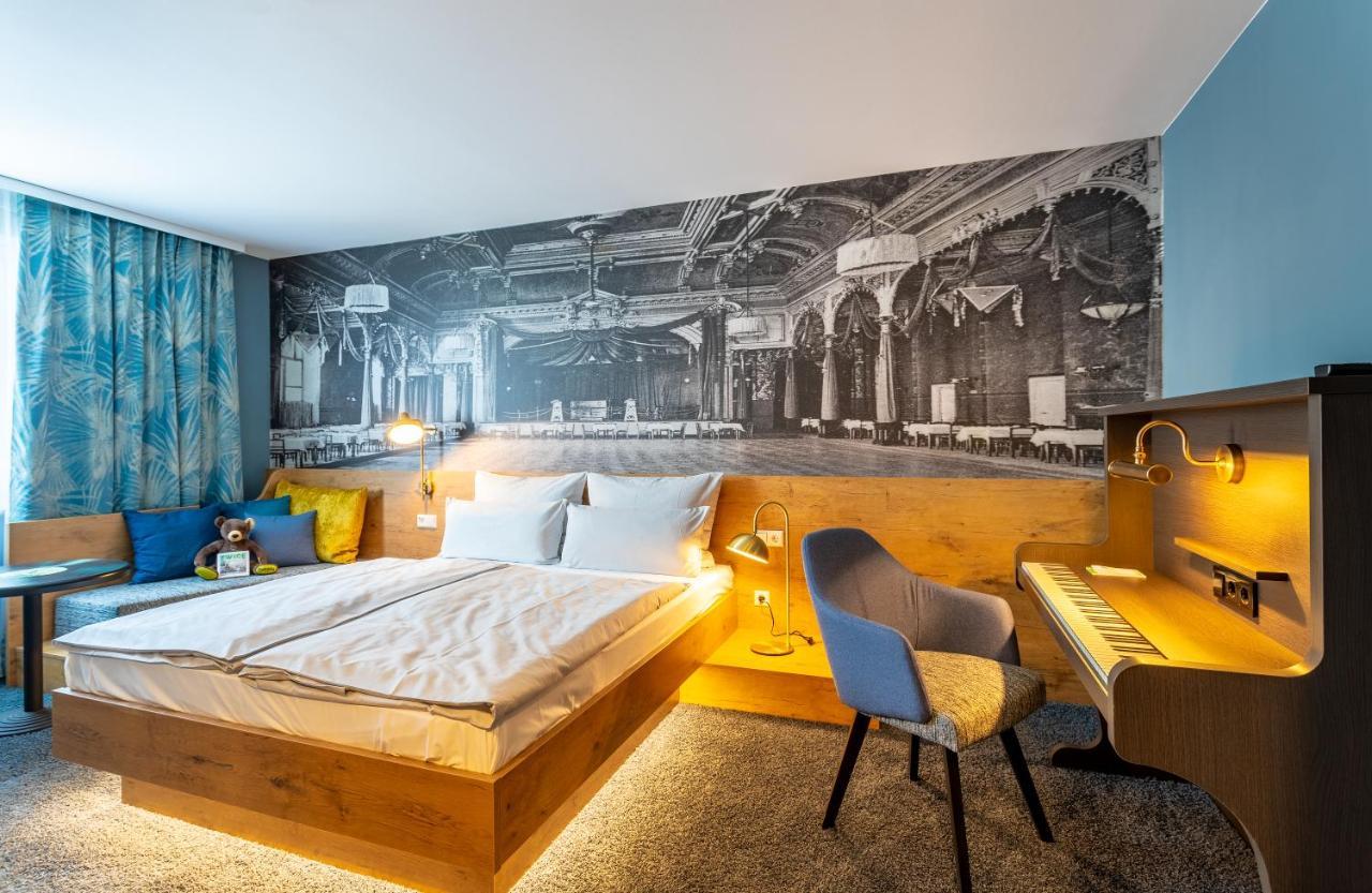 Doppelzimmer „COSY" mit Queensize-Bett