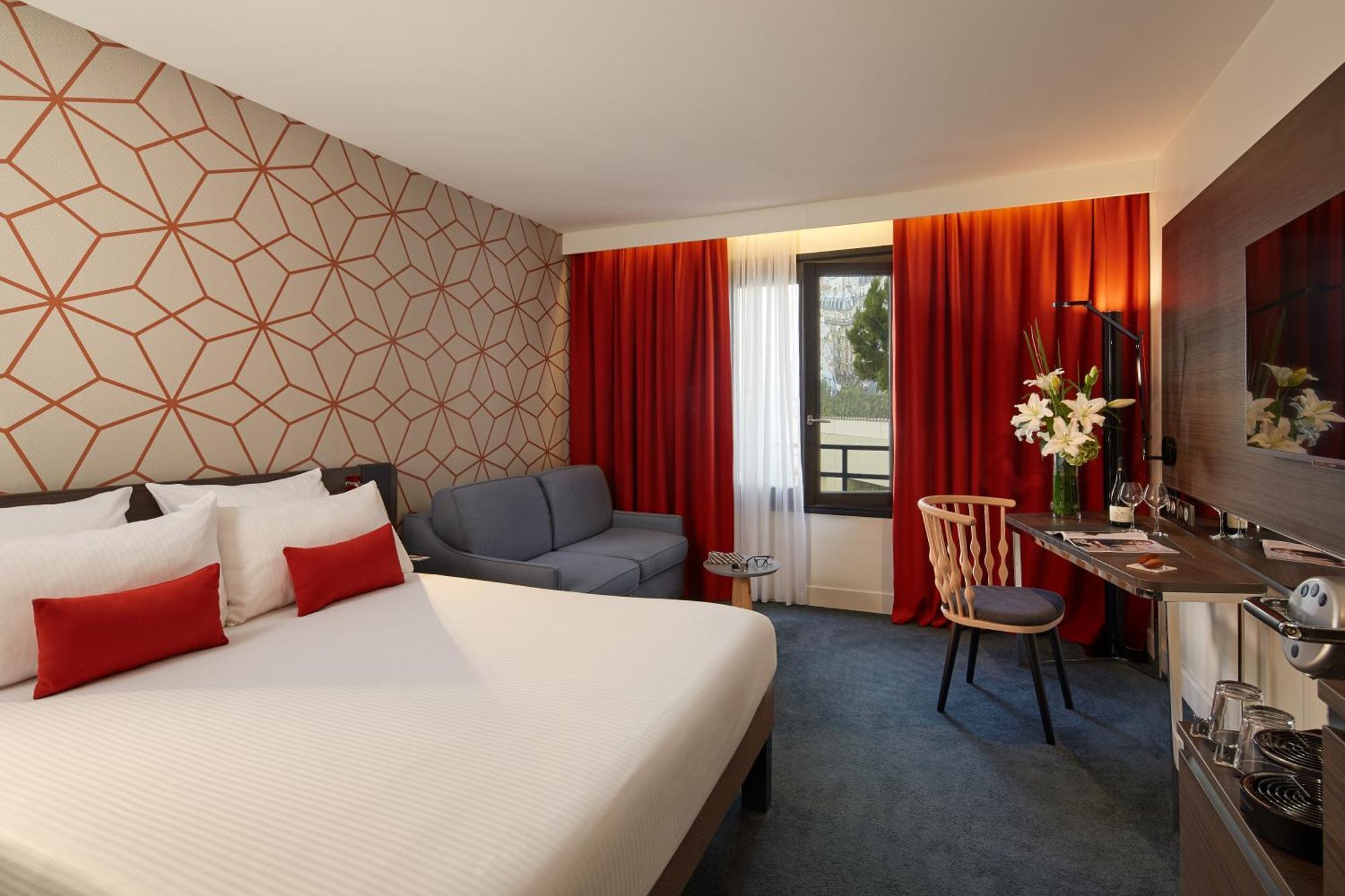 Executive Kamer met een Queensize Bed en Slaapbank voor 2 Personen