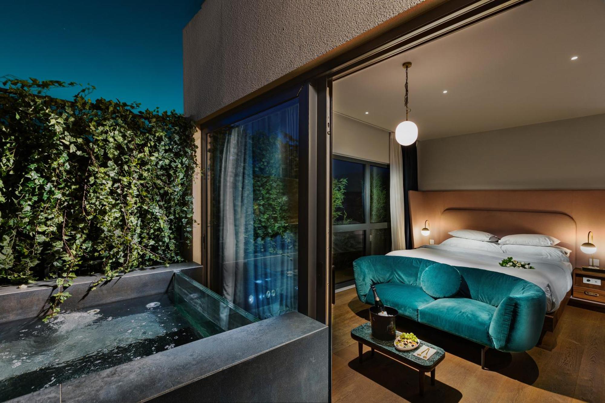 Suite mit Kingsize-Bett und Balkon