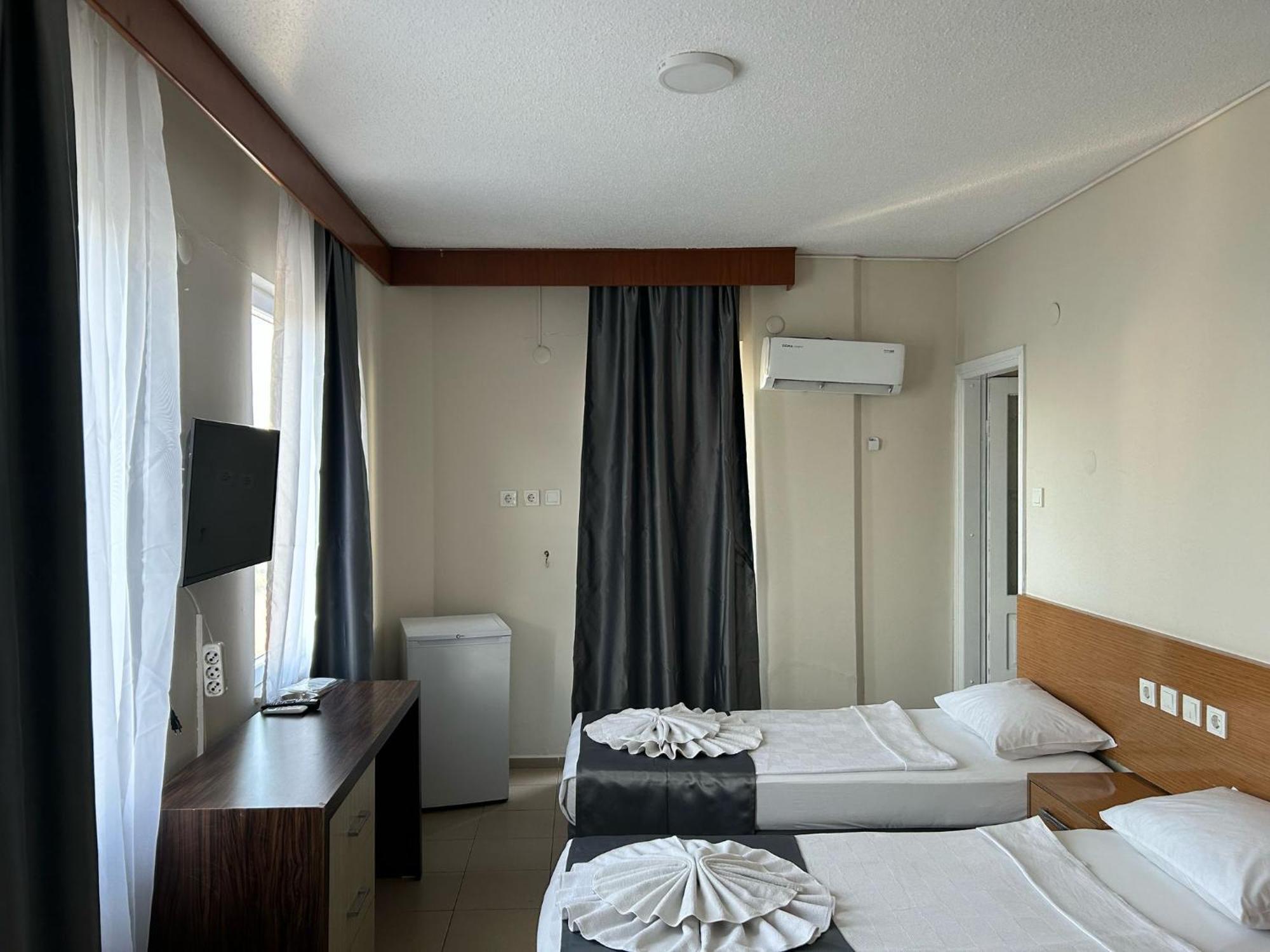Dreibettzimmer mit Meerblick