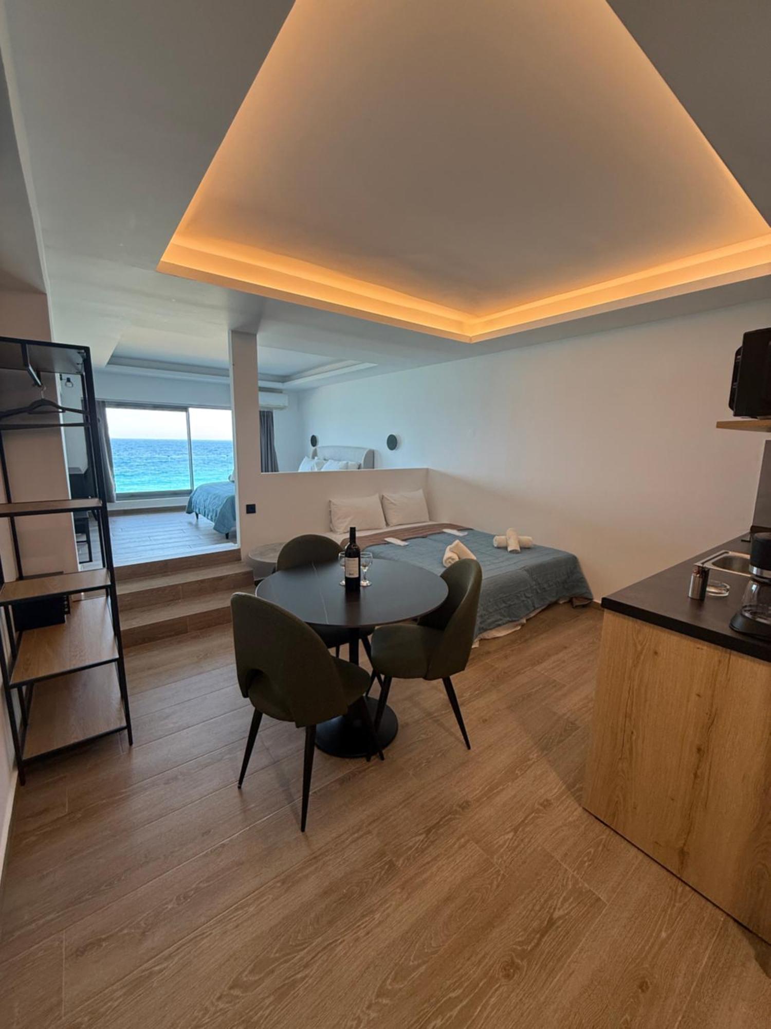 Kamer met Queensize Bed en Uitzicht op Zee