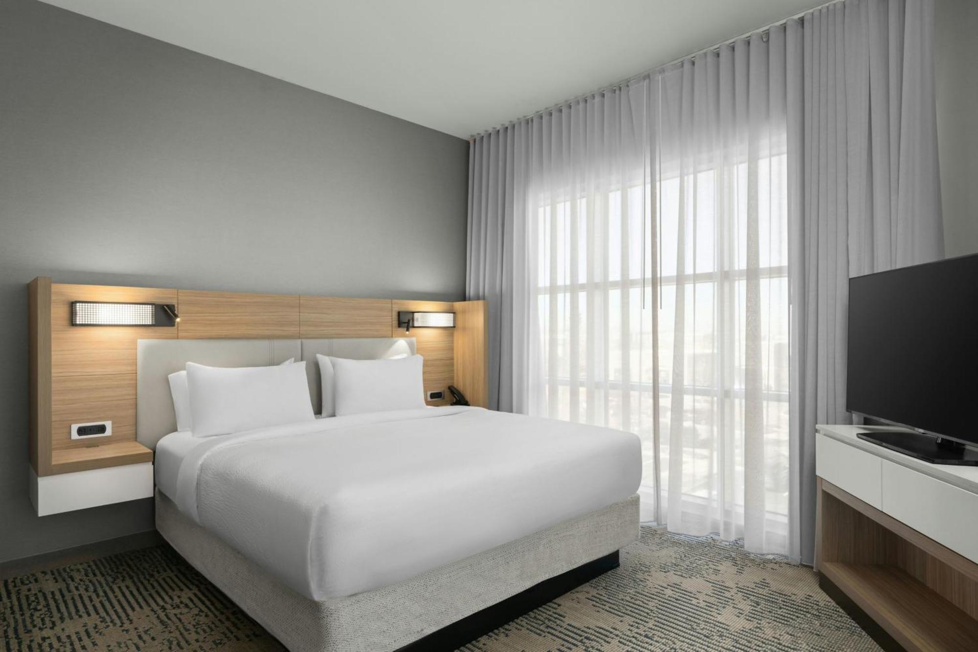 One-Bedroom King Suite with Sofa Bed and Roll-In Shower - Mobility and Hearing Accessible,1758550077:JPEG