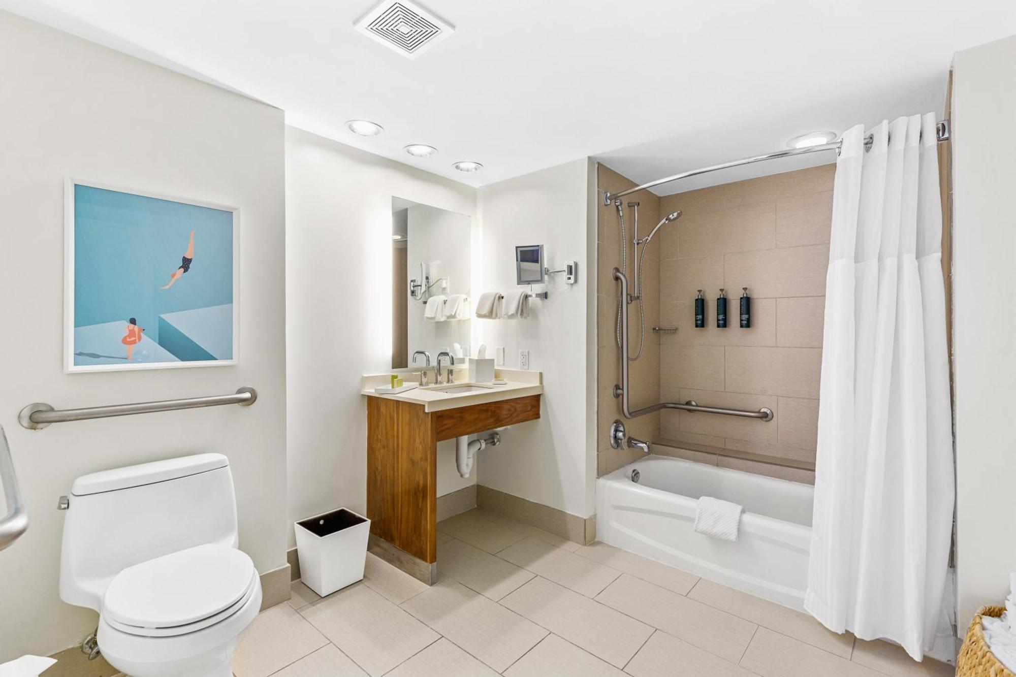 Queen Room Partial View Tub Mobility or Hearing Access