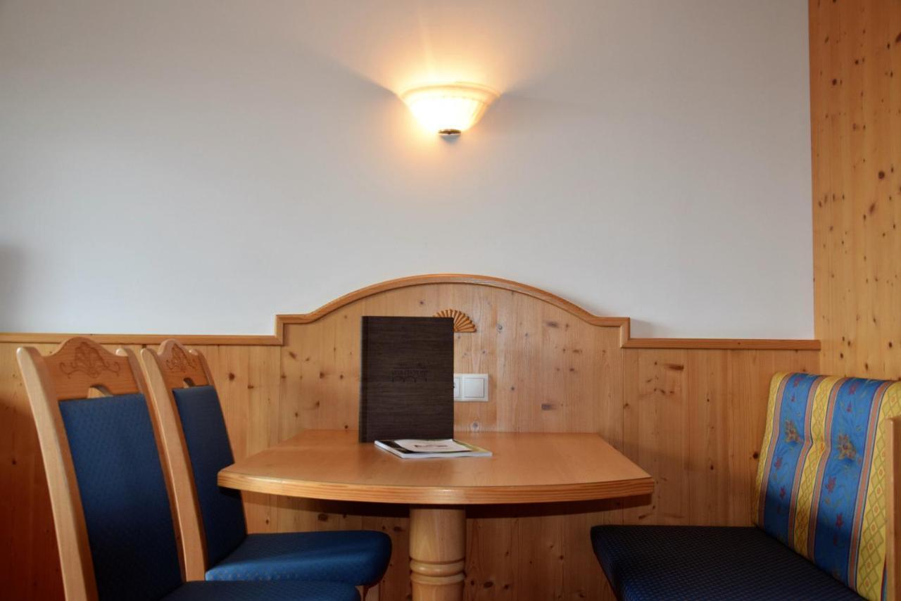 Family Room with Balcony and Mountain View,974068363:JPEG